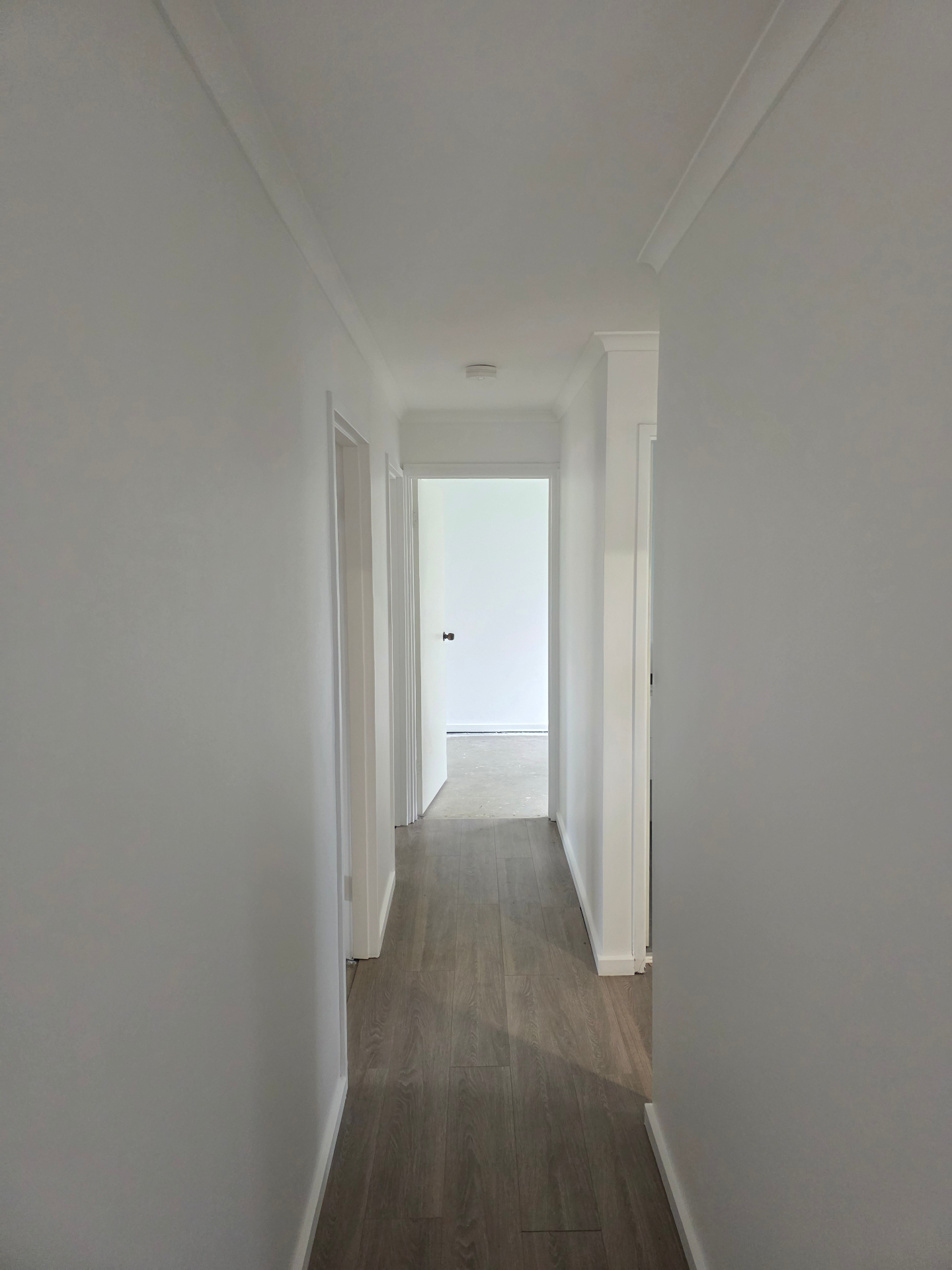 Freshly painted bright white hallway interior